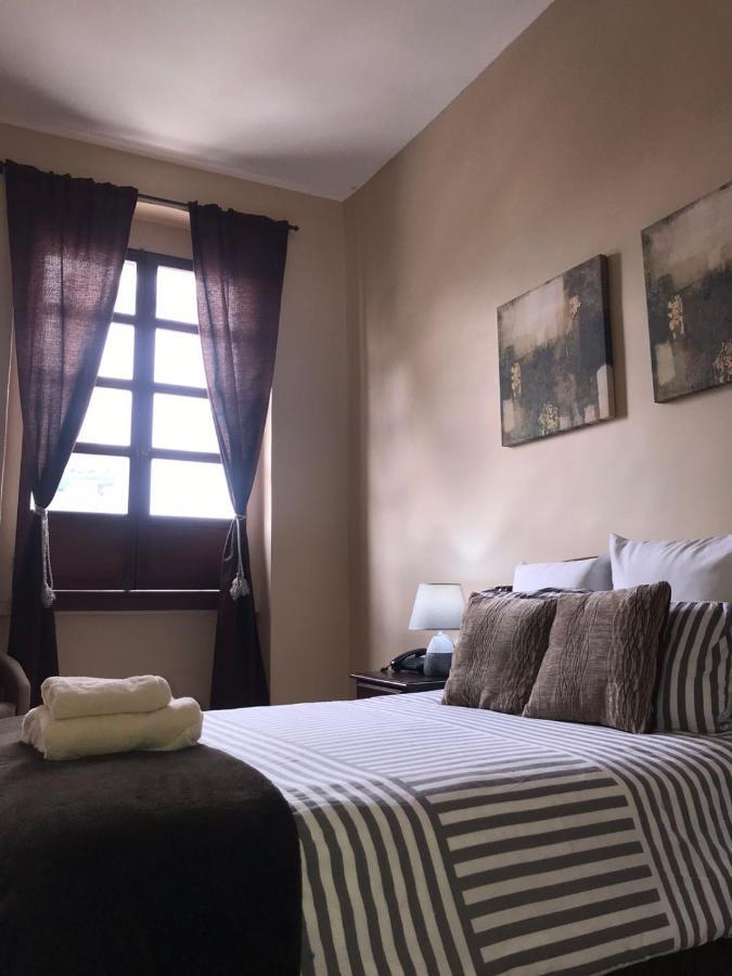 Hotel En El Centro Historico Куэнка Экстерьер фото