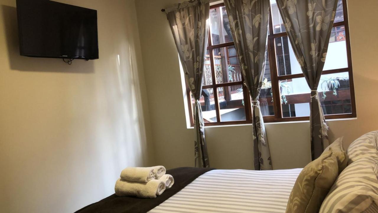 Hotel En El Centro Historico Куэнка Экстерьер фото